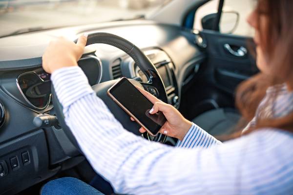 Addressing Driver Distractions Ontario's Regulations and Best Practices